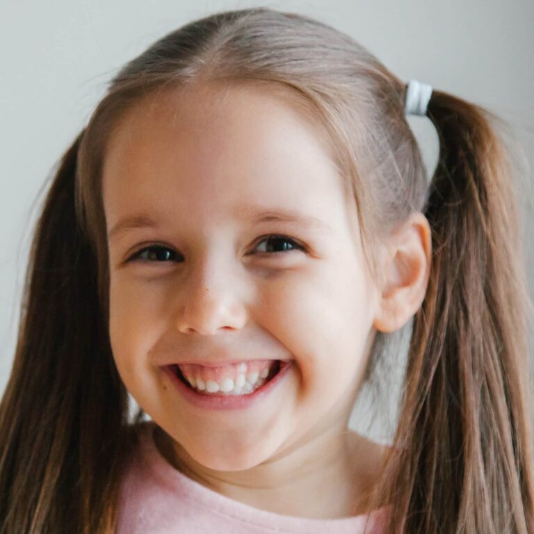 portrait-of-a-smiling-child-2022-11-10-18-03-18-utc (1)